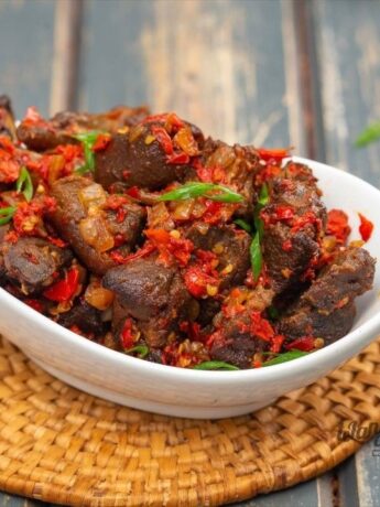 1 Delicious Asun Recipe: Spicy Peppered Goat Meat.